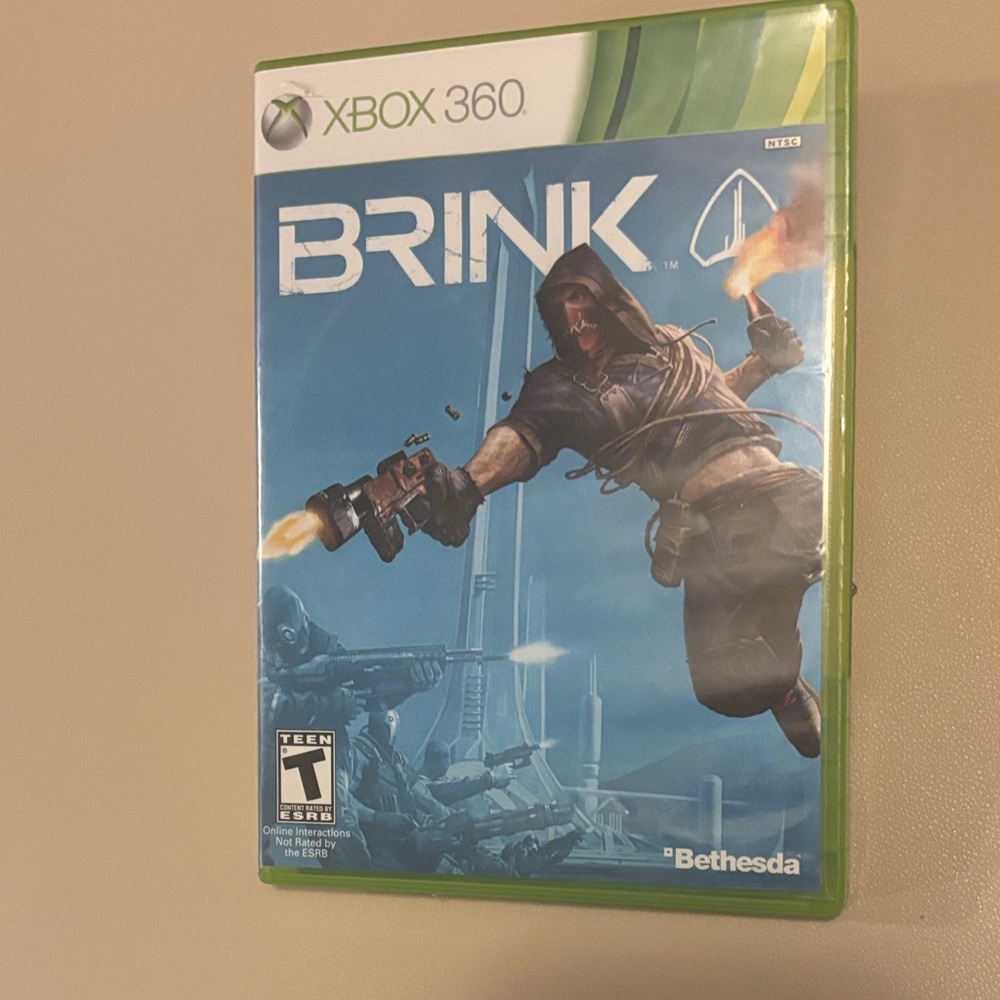 Revolution Brink for Xbox 360 - Green Case